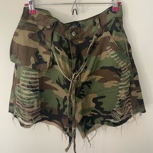 MICAS distressed camo shorts with faux drawstring.